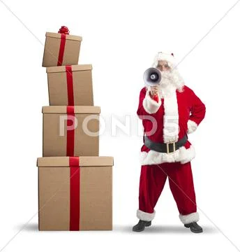 Santa claus with gift Stock Photos
