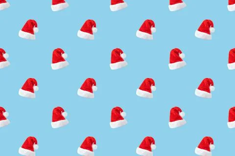 Santa Claus hat seamless pattern on blue background 写真素材