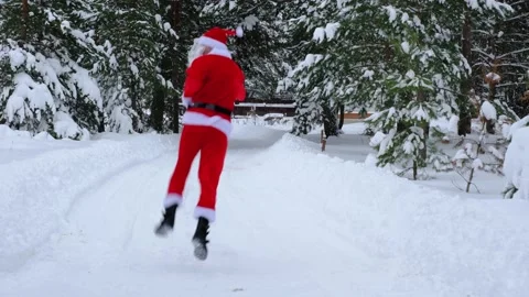 Santa Claus is having fun and funny dancing, shows acrobatic tricks, elements of Stock Footage 231040285