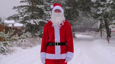 Santa Claus is having fun and funny dancing, shows acrobatic tricks, elemen.. Stock Footage 231094872