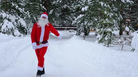 Santa Claus is having fun and funny dancing, shows acrobatic tricks, elemen.. Stock Footage 231139954