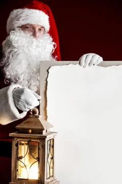 Santa Claus with lantern Stock Photos