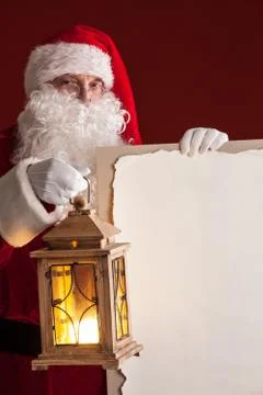 Santa Claus with lantern Stock Photos