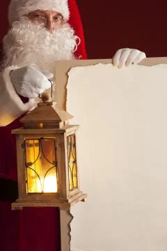 Santa Claus with lantern Stock Photos