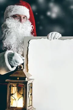 Santa Claus with lantern Stock Photos