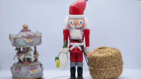 Santa Claus nutcracker Christmas decorations closeup on white background Stock Footage 162586331