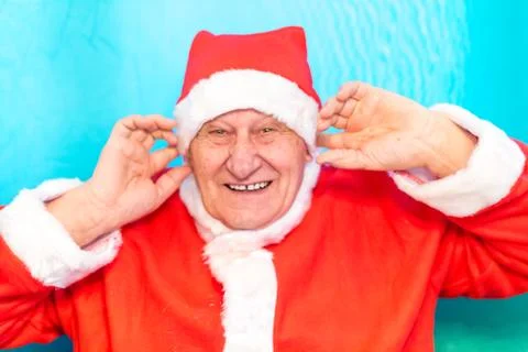 Santa Claus plugging ears Stock Photos