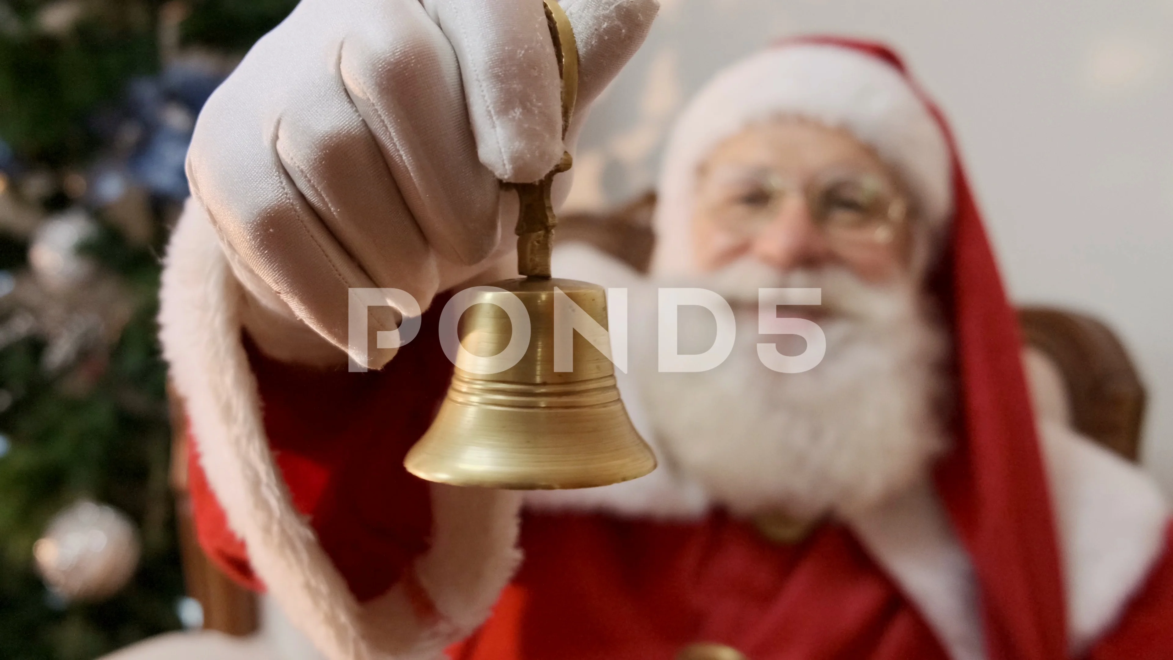 Santa Claus ringing a small bell. Jingle, Stock Video