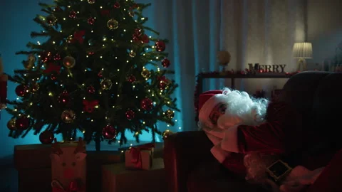 Santa Claus sleeping on the sofa Stock Footage 318079269