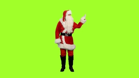 Santa Claus something presenting on green screen background, 4k footage Stock Footage 81808321