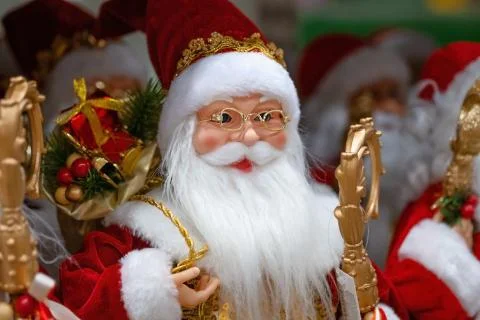 Santa Claus toy figure on sale at mall. Store with holiday gifts Stock Photos