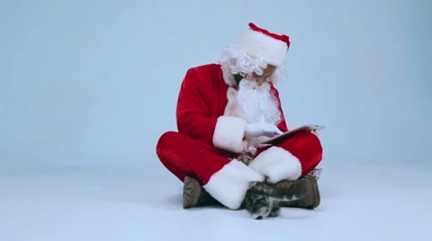 Santa Claus uses a tablet Stock Footage 42565333