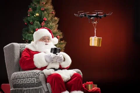 Santa Claus using drone Stock Photos