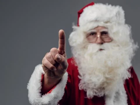 Santa Claus using a touch screen user interface Stock Photos