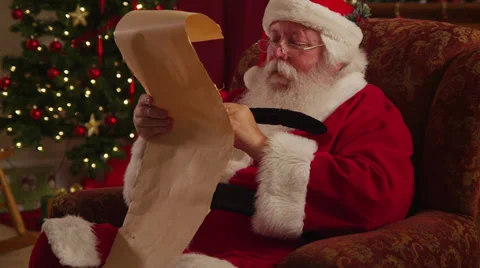 Santa Claus writes on list Stock Footage