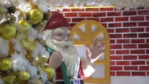 Santa clause with spruce pine tree Christmas decoration snow and light ball Stock Footage 226942634