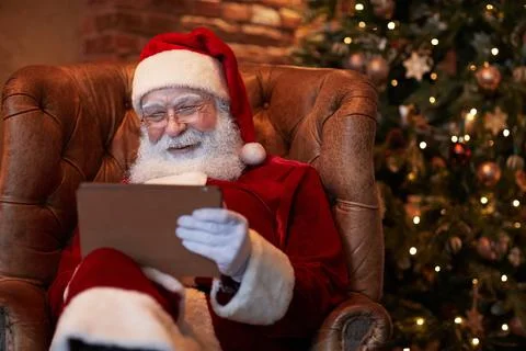 Santa Composing To-Do-List Stock Photos