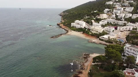 Santa Eulària des Riu, Spain and Siesta- Beach and Mountain Aerial in Ibiza Stock Footage 166080019