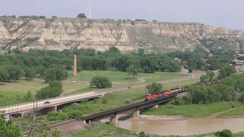 Santa Fe Coal Train Crossing the Little Missouri River in Medora, North Dakota Stock Footage 81899075