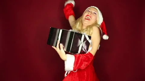 Santa girl is excited about present Stock Footage