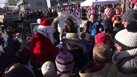 Santa Greeting the Parade Crowd Stock Footage 70336232