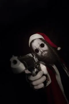 Santa with gun Stock Photos