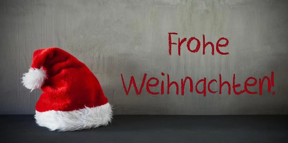 Santa Hat, Frohe Weihnachten Means Merry Christmas Stock Photos