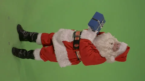 Santa holds present Stock Footage 31813556