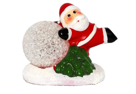 Santa leaning on the globe Stock Photos