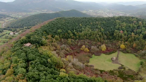 The Santa Margarida volcano with a hermitage in the centre of its crater Stock Footage 146552484