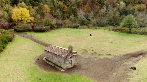 The Santa Margarida volcano with a hermitage in the centre of its crater Stock Footage 146552486