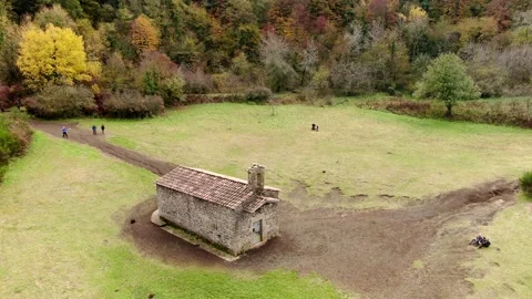 The Santa Margarida volcano with a hermitage in the centre of its crater Stock Footage 154280468