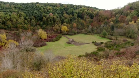 The Santa Margarida volcano with a hermitage in the centre of its crater Stock Footage 154299662