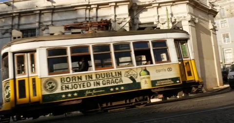 Santa Maria Maior or Se Cathedral and Tram in Alfama, Lisbon, Portugal Stock Footage 59121147
