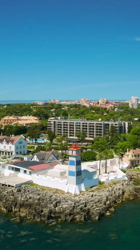 Santa Marta light house and Cascais marina with Cascais cityscape, Portugal Stock-Footage 344583306