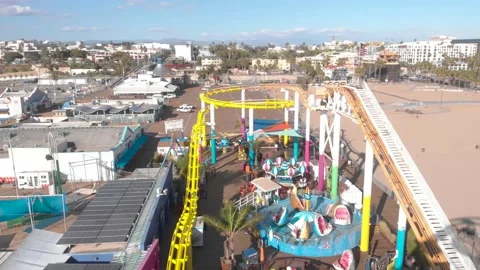 Santa Monica Pier Roller Coaster and Beach, 4K Aerial Stock Footage 148895158