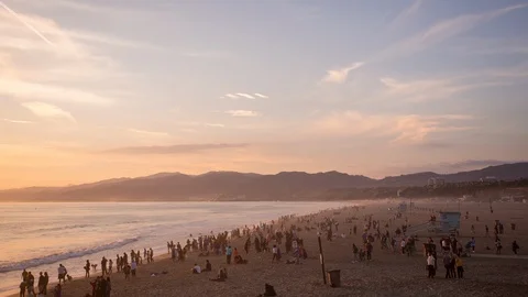 Santa Monica Sunset with Beach Goers and Life Guard House Stock Footage 94444331