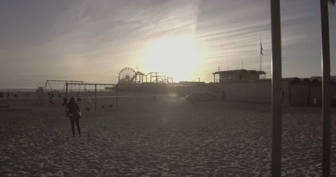 Santa Monica - Tracking Side To Side Of The Pier, Sand &amp; Recreation Equipment Stock Footage 87382793