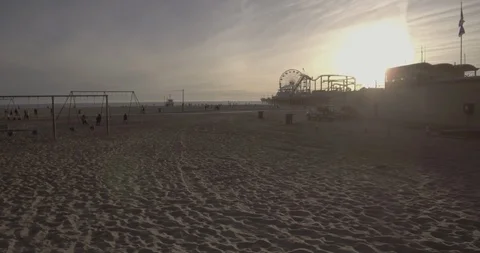 Santa Monica - Tracking Side To Side Of The Pier, Sand &amp; Recreation Equipment Stock Footage 87447813