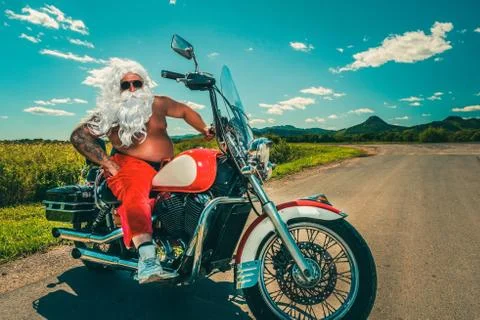 Santa on a motorcycle Stock Photos