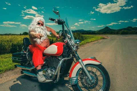 Santa on a motorcycle Stock Photos