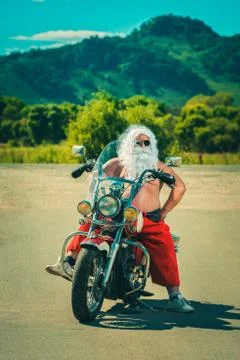 Santa on a motorcycle Stock Photos