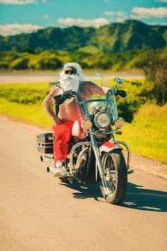 Santa on a motorcycle Stock Photos