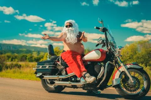 Santa on a motorcycle Stock Photos