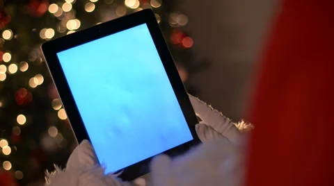 Santa over the shoulder ipad Stock Footage 31812622