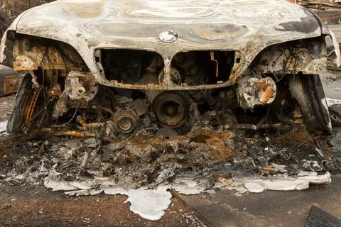 SANTA ROSA, USA - 11/09/2017: Burned sports car with melted aluminum engine Stock Photos