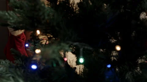 Santa socks on new year tree background Stock Footage