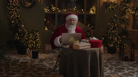 Santa Is Working on Computer Stock Footage 219573590