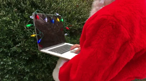 Santa working on a laptop Stock Footage 66925857