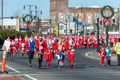 Santas on the run Stock Photos